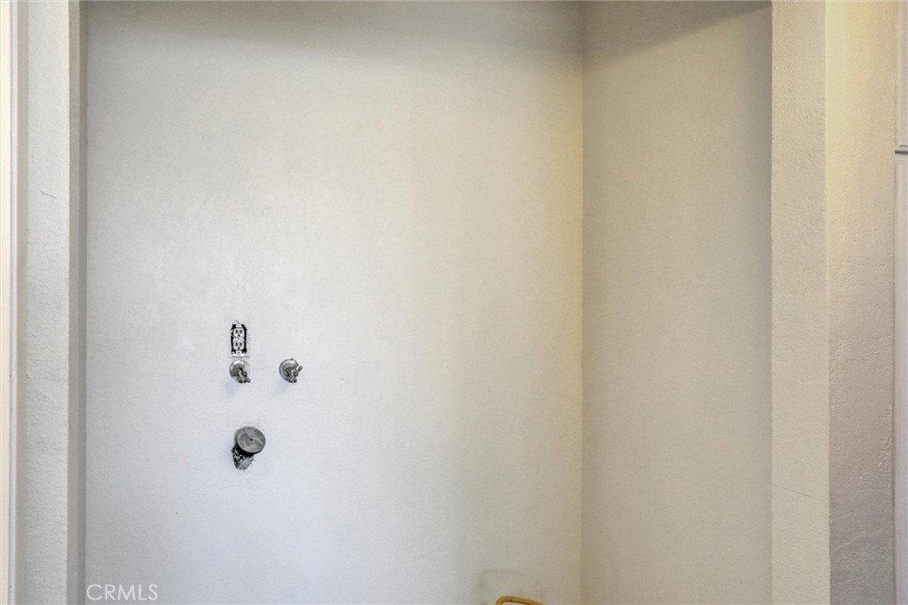 21309 Eucalyptus Way, Unit 203 Newhall, CA 91321 - Photo 11 of 20 Inside Laundry Closet