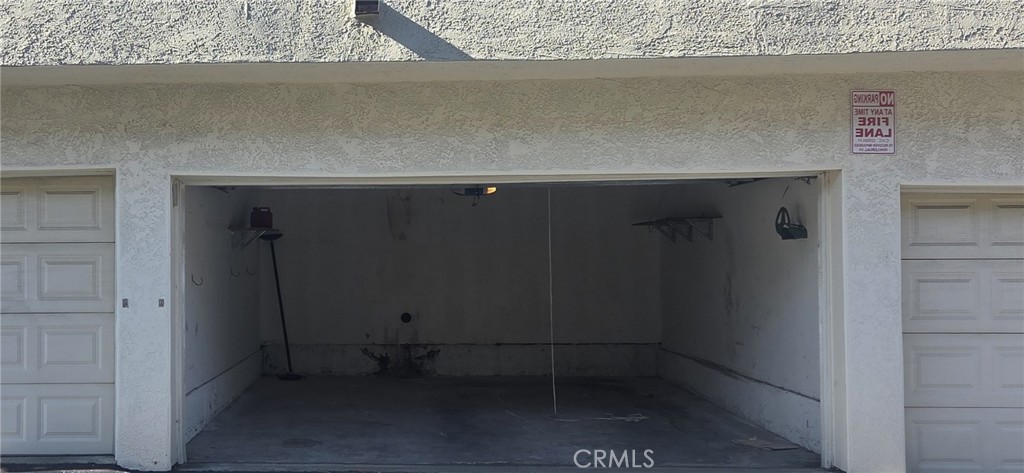 21309 Eucalyptus Way, Unit 203 Newhall, CA 91321 - Photo 15 of 20 an empty room with wooden floor
