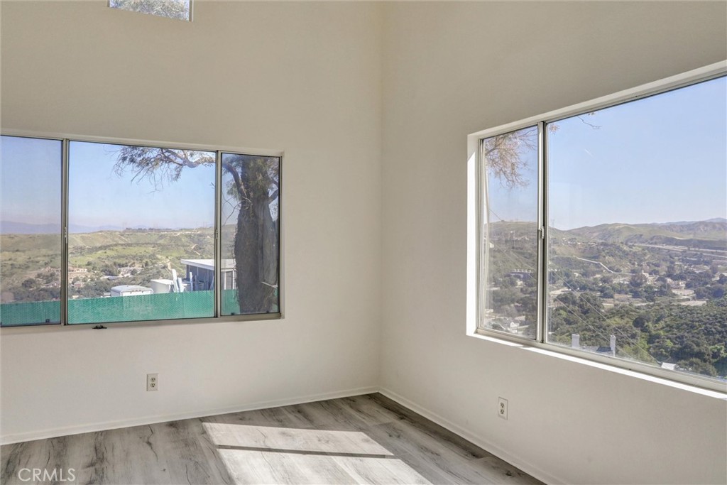 21309 Eucalyptus Way, Unit 203 Newhall, CA 91321 - Photo 6 of 20 a view of a room with window