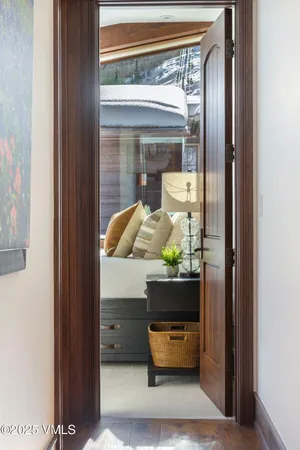 a living room with a table and a window