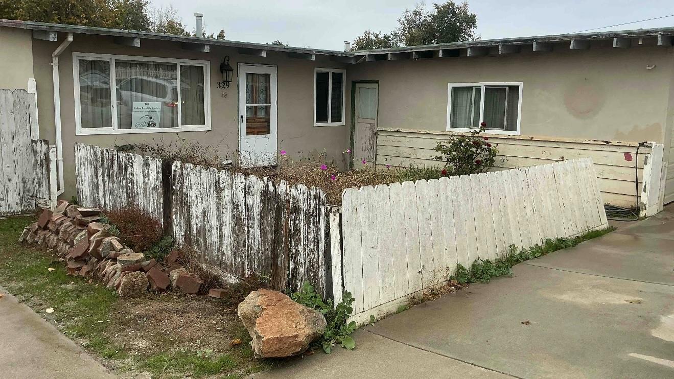 329 San Juan Grade Road Salinas, CA 93906 - Photo 1 of 1 a front view of a house with a yard