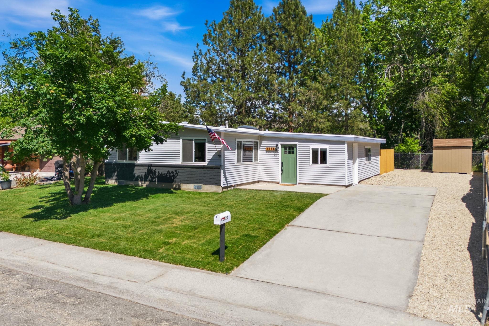 2224 Rachel Circle Boise, ID 83706 - Photo 49 of 50 Modern ranch-style home featuring light gray horizontal siding and a contrasting dark gray lower facade