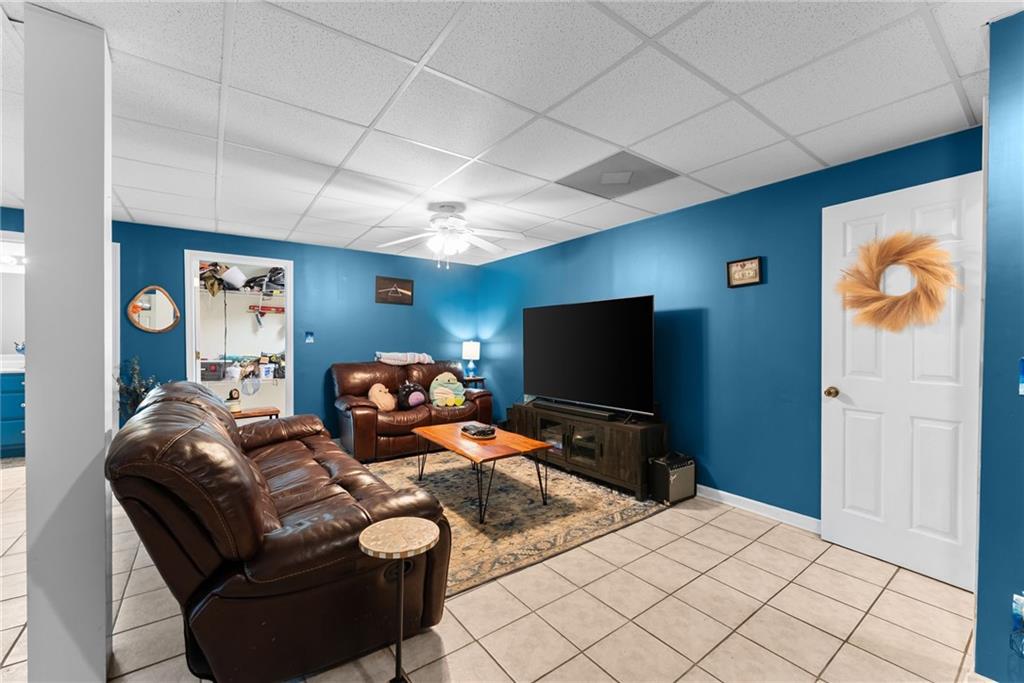 3615 South Bend Road Gainesville, GA 30506 - Photo 39 of 54 a living room with furniture and a flat screen tv
