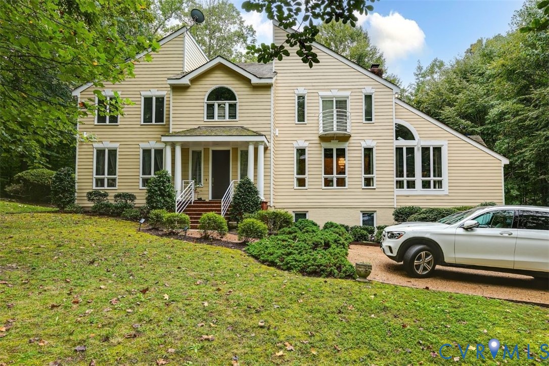 3820 Reeds Landing Circle Midlothian, VA 23113 - Photo 1 of 25 a house view with a garden space