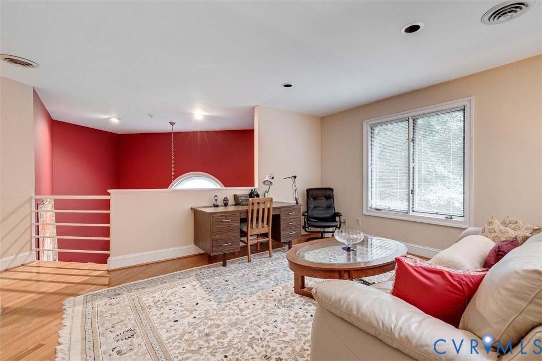 3820 Reeds Landing Circle Midlothian, VA 23113 - Photo 11 of 25 a living room with furniture and a window