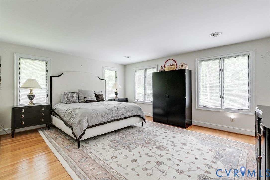 3820 Reeds Landing Circle Midlothian, VA 23113 - Photo 14 of 25 a bedroom with a bed and a large window