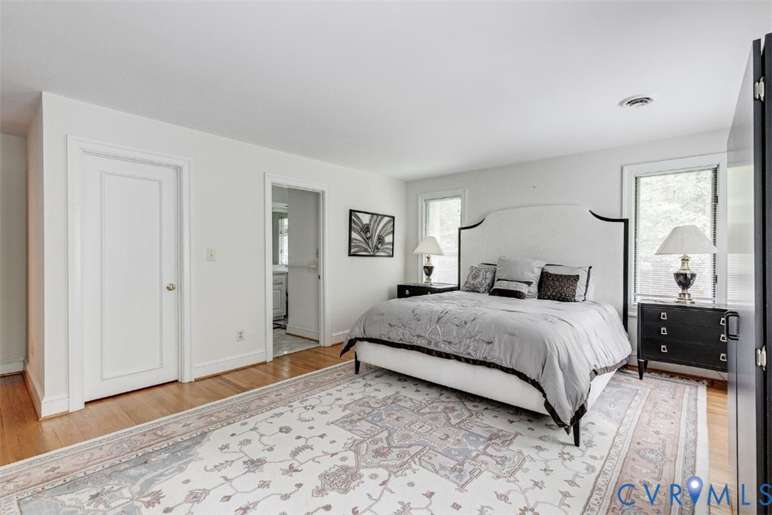 3820 Reeds Landing Circle Midlothian, VA 23113 - Photo 15 of 25 a spacious bedroom with a bed and a dresser