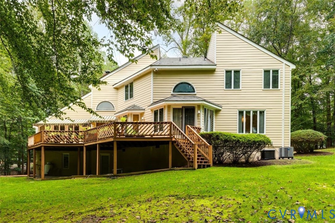 3820 Reeds Landing Circle Midlothian, VA 23113 - Photo 17 of 25 a front view of a house with a garden