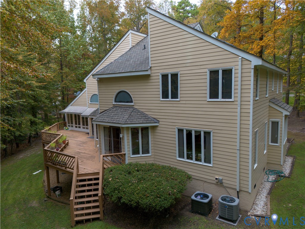 3820 Reeds Landing Circle Midlothian, VA 23113 - Photo 22 of 25 a front view of a house with a garden