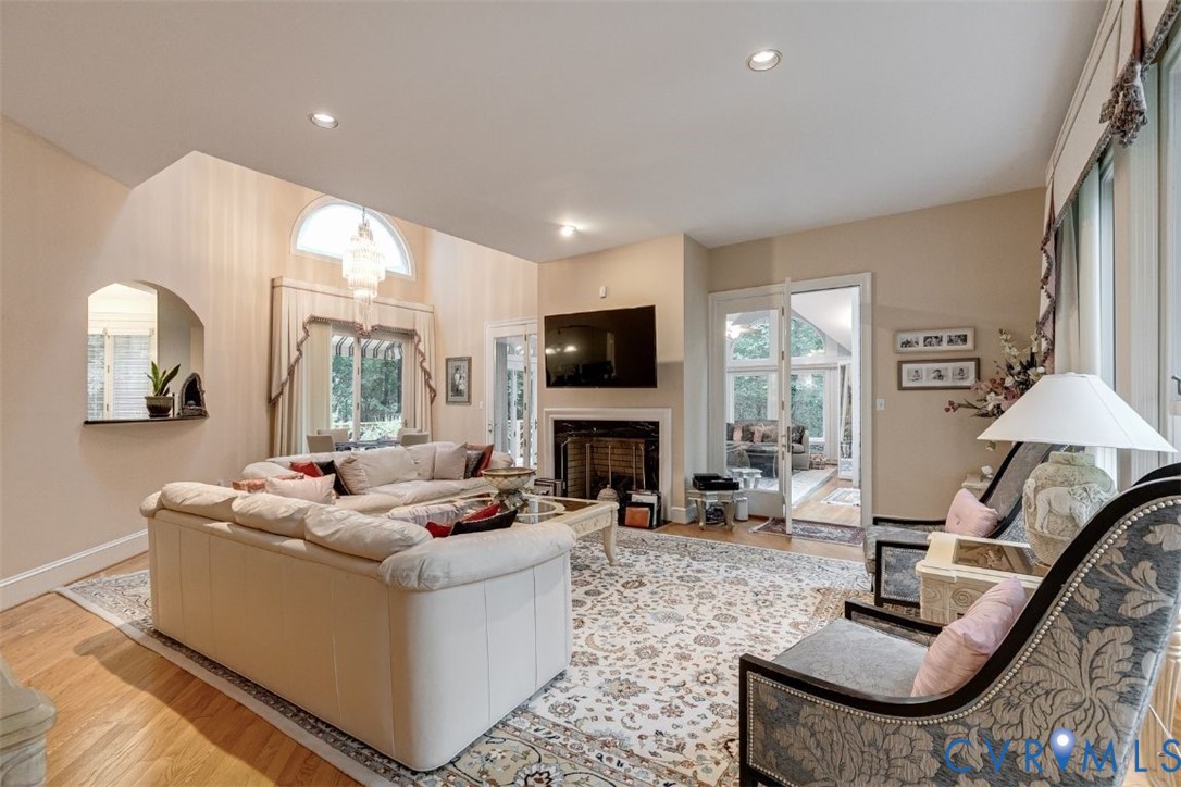 3820 Reeds Landing Circle Midlothian, VA 23113 - Photo 6 of 25 a living room with fireplace furniture and a large window