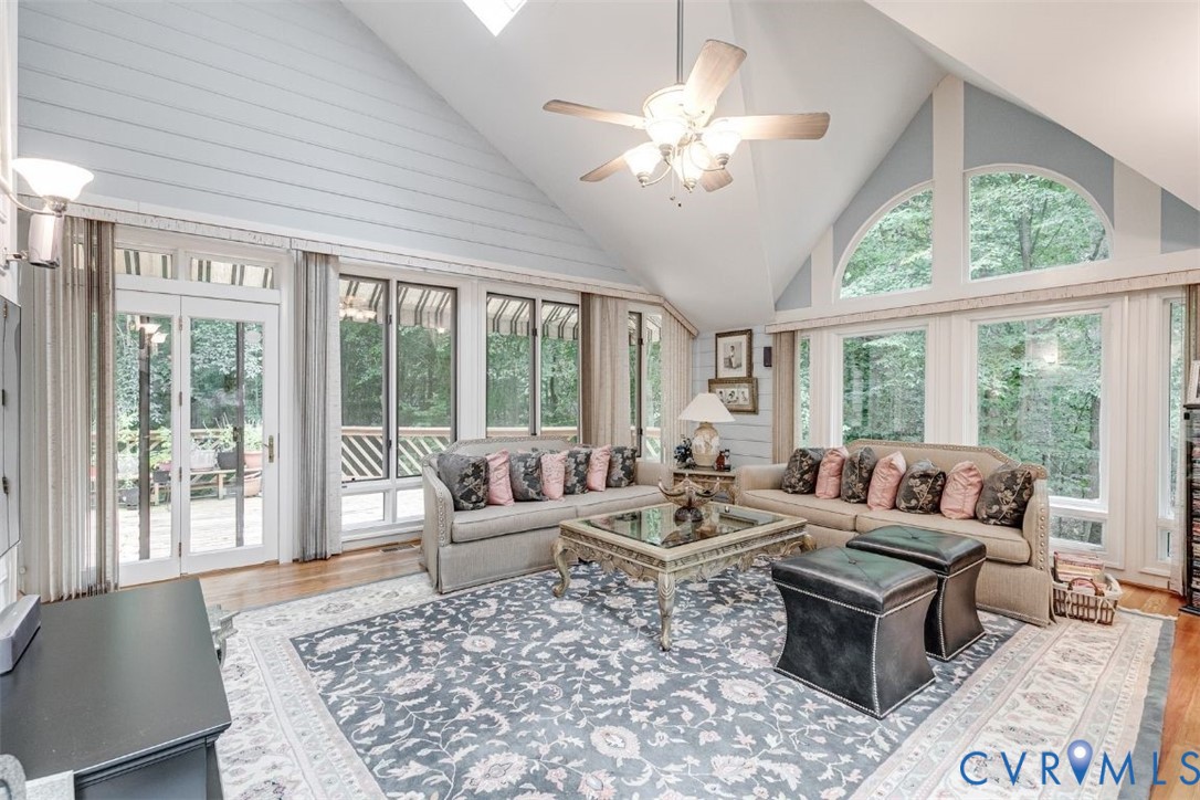 3820 Reeds Landing Circle Midlothian, VA 23113 - Photo 7 of 25 a living room with furniture large windows and wooden floor