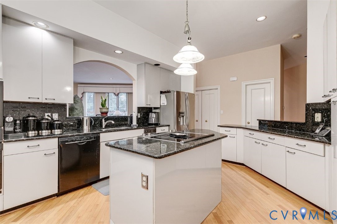 3820 Reeds Landing Circle Midlothian, VA 23113 - Photo 8 of 25 a kitchen with a sink stove and refrigerator