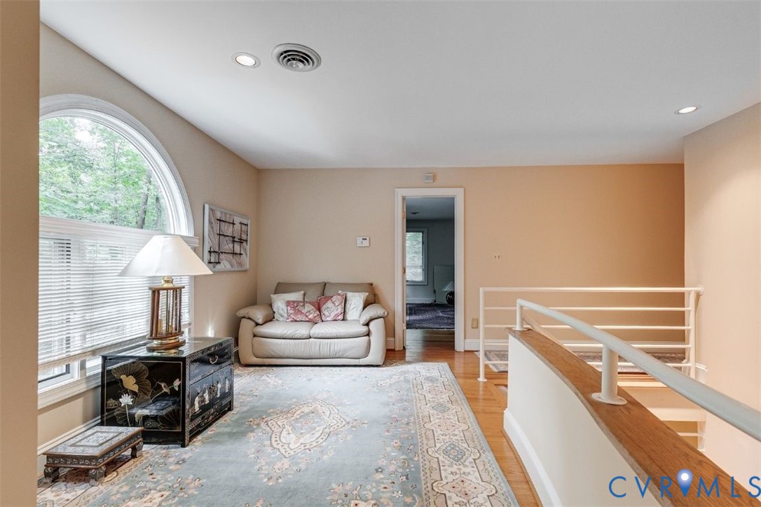 3820 Reeds Landing Circle Midlothian, VA 23113 - Photo 10 of 25 a living room with furniture and a large window