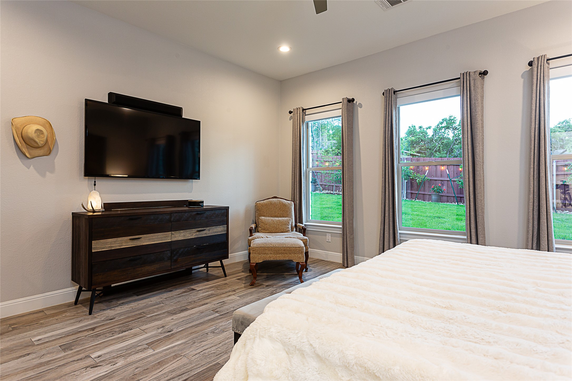 5608 Arroyo Road Austin, TX 78734 - Photo 22 of 39 Bedroom with light wood-style floors, ceiling fan, and recessed lighting