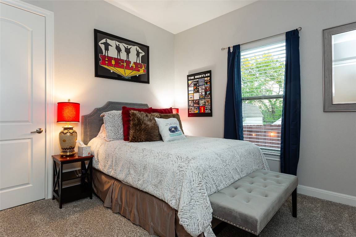 5608 Arroyo Road Austin, TX 78734 - Photo 28 of 39 Bedroom featuring carpet