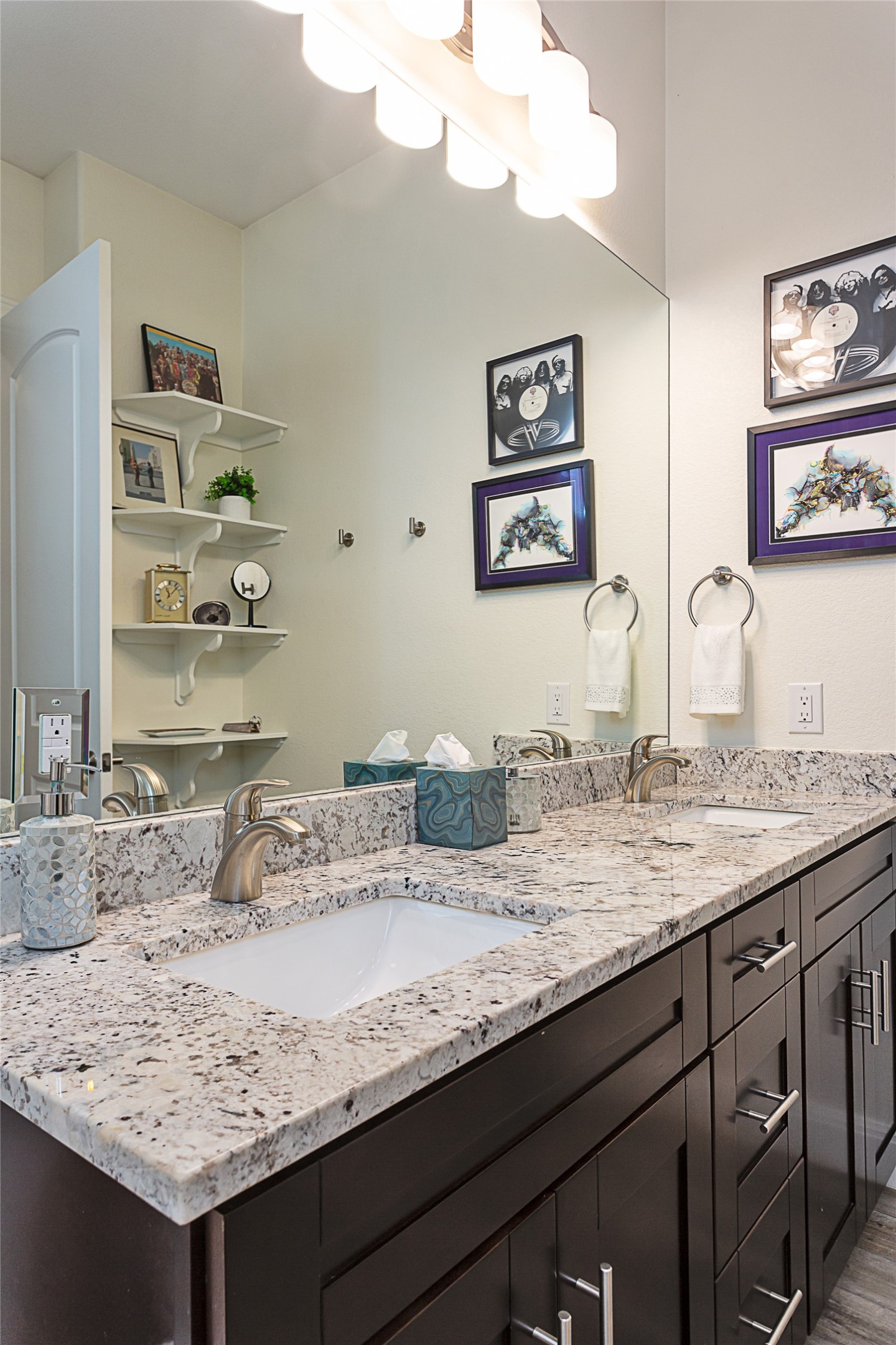 5608 Arroyo Road Austin, TX 78734 - Photo 31 of 39 Bathroom with double vanity and light wood-type flooring