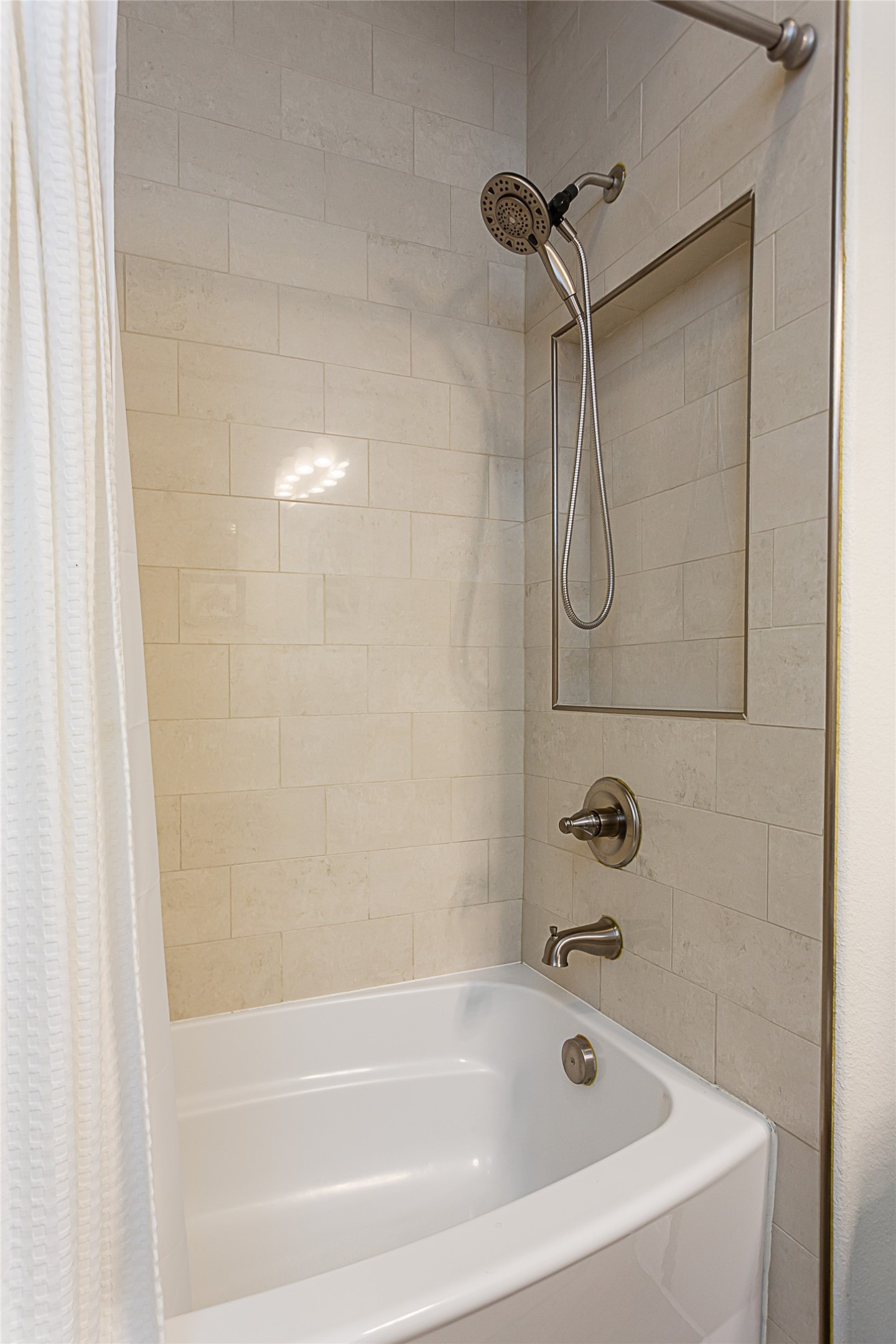5608 Arroyo Road Austin, TX 78734 - Photo 32 of 39 Full bathroom with shower / bathtub combination with curtain