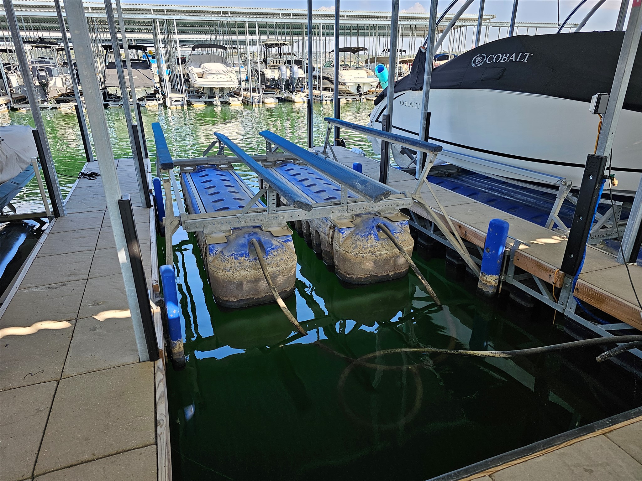 5608 Arroyo Road Austin, TX 78734 - Photo 38 of 39 Dock area with boat lift and a water view