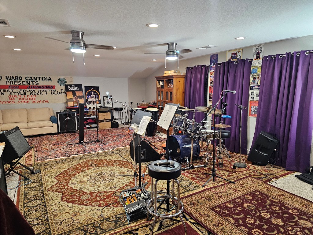 5608 Arroyo Road Austin, TX 78734 - Photo 39 of 39 HUGE Game room with recessed lighting and a ceiling fan