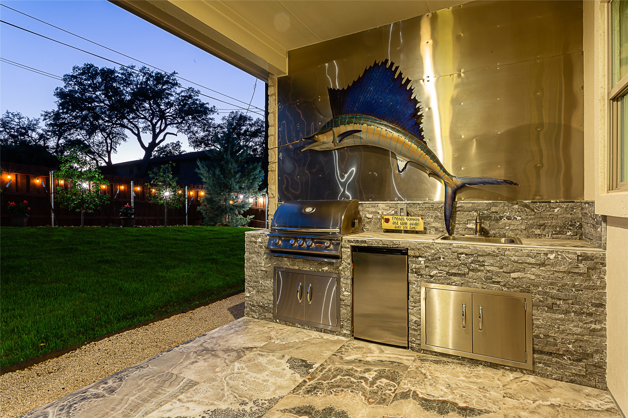 5608 Arroyo Road Austin, TX 78734 - Photo 5 of 39 View of patio with a sink and area for grilling