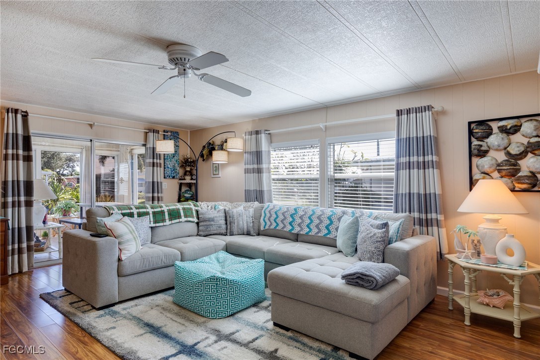 9324 Baron Road Bonita Springs, FL 34135 - Photo 11 of 22 a living room with furniture and a large window
