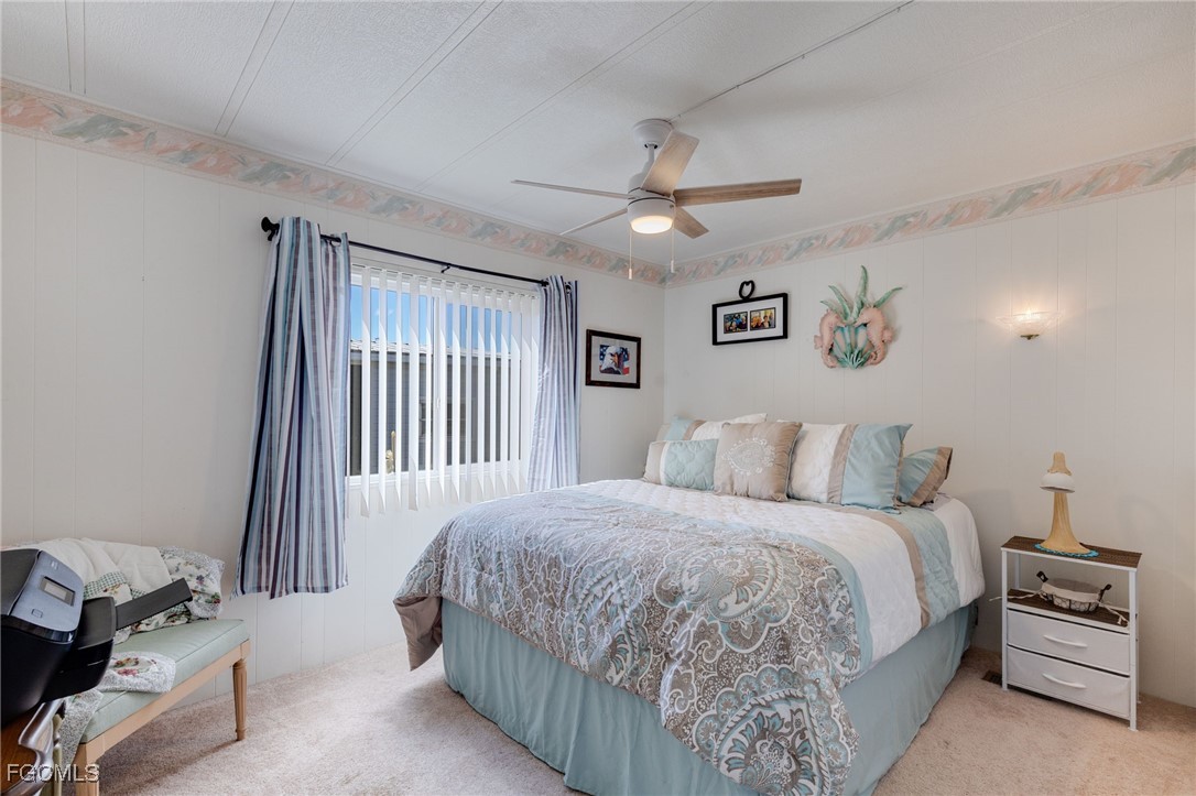 9324 Baron Road Bonita Springs, FL 34135 - Photo 16 of 22 a bedroom with a bed and a window
