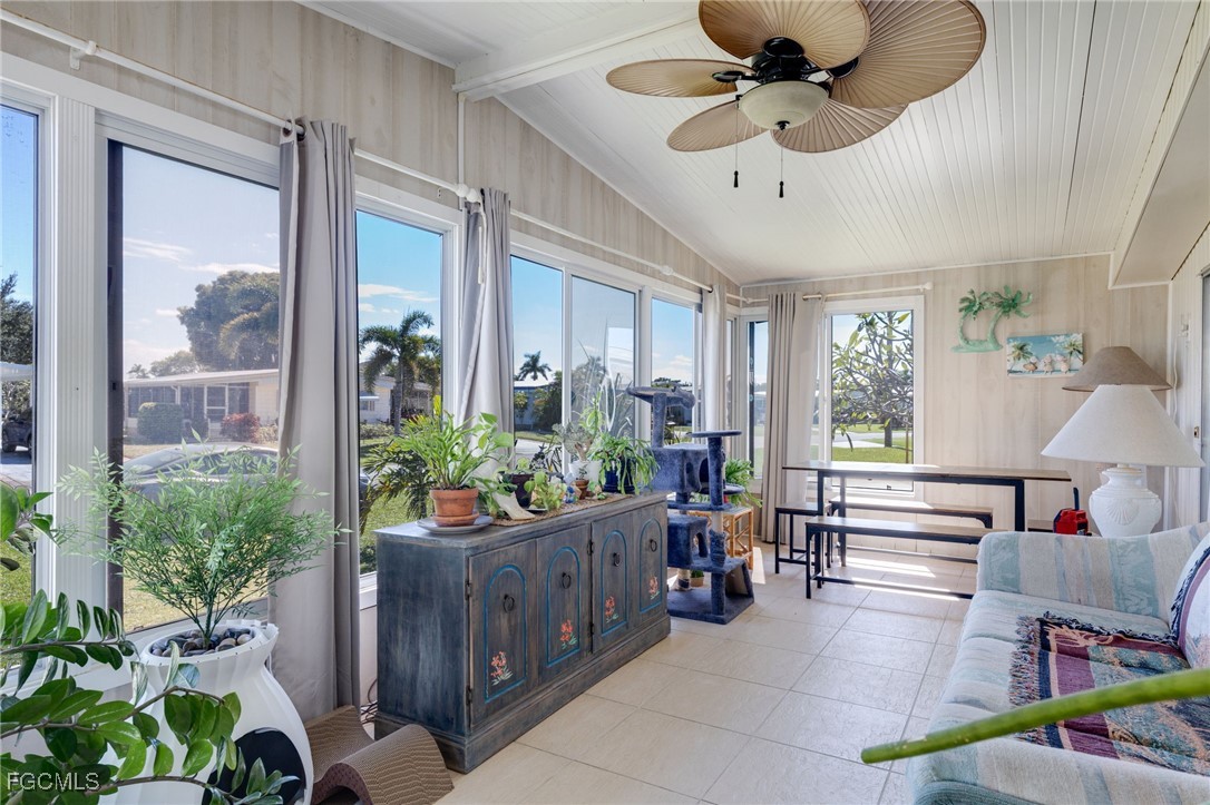 9324 Baron Road Bonita Springs, FL 34135 - Photo 17 of 22 a living room with furniture and a large window