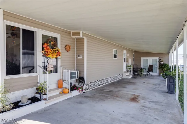 a view of a porch with seating space