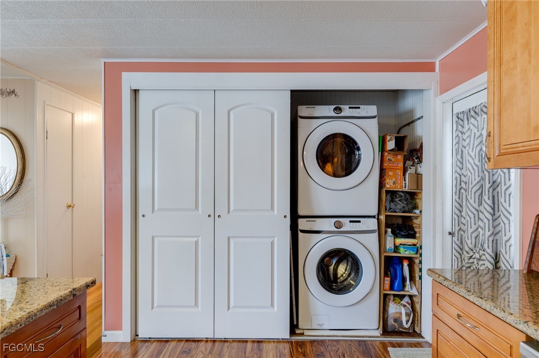 9324 Baron Road Bonita Springs, FL 34135 - Photo 3 of 22 a utility room with dryer and washer