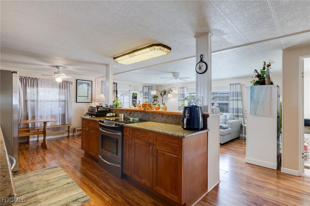 9324 Baron Road Bonita Springs, FL 34135 - Photo 5 of 22 a view of a living room and dining room