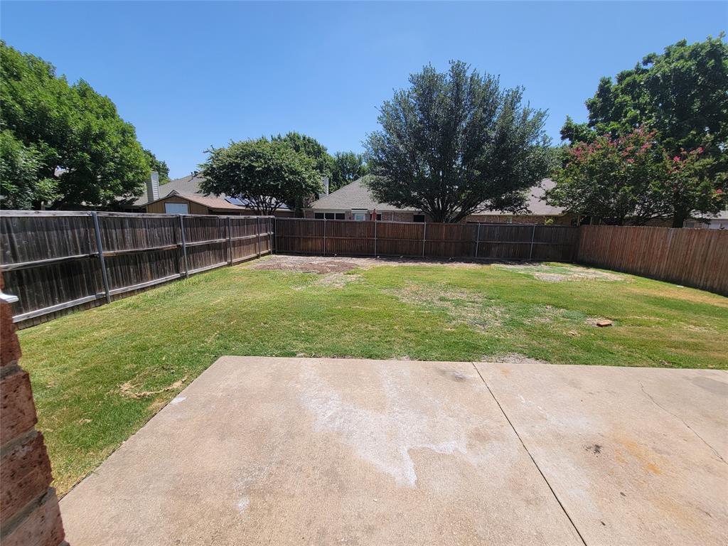 2913 Rush Creek Road McKinney, TX 75072 - Photo 20 of 32 View of yard with a patio and some new fence