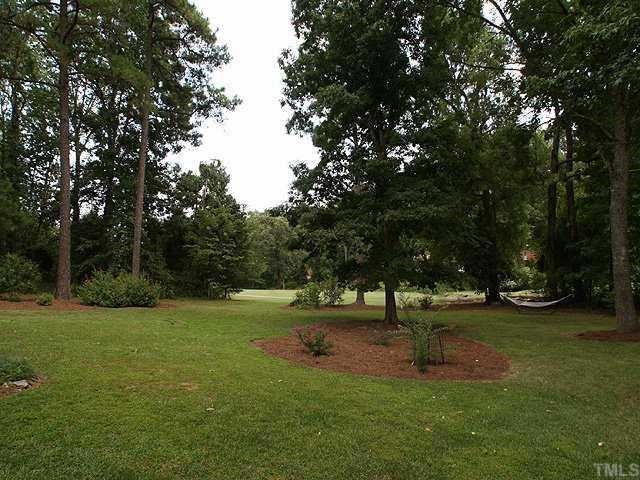 2649 Umstead Road Durham, NC 27712 - Photo 9 of 12 Relax and enjoy the half acre that lead directly to the golf course! Drought resistant plantings/shrubs. What a delight to welcome you home each day and have friends and family over for a cook out!