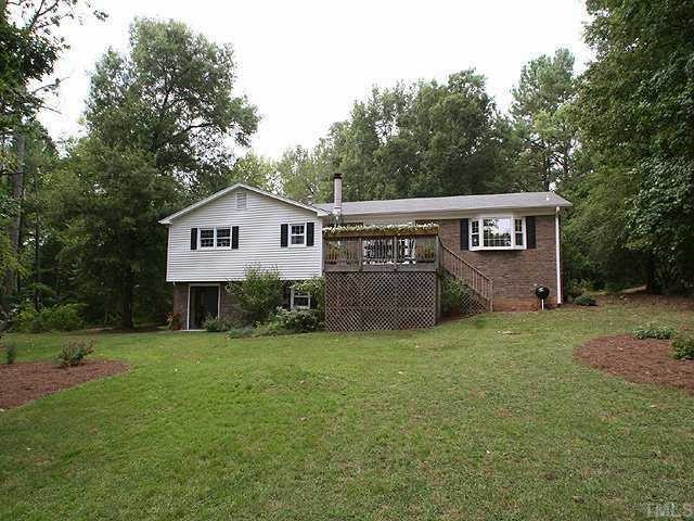 2649 Umstead Road Durham, NC 27712 - Photo 10 of 12 View from the edge of the yard near the golf course looking back to the home.