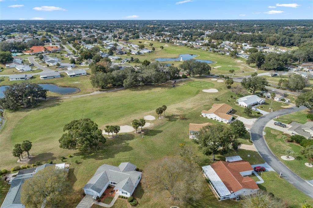 10492 Southeast 178th Street Summerfield, FL 34491 - Photo 29 of 32 an aerial view of a house with a yard