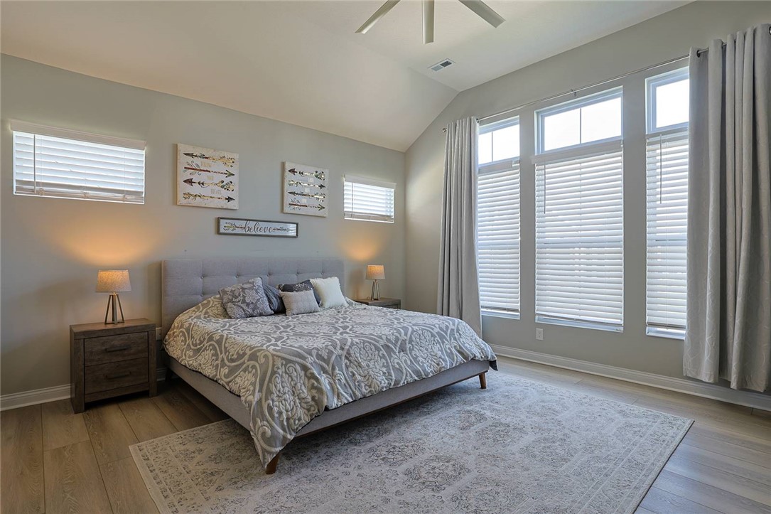 5013 Arena Court Hamilton, OH 45011 - Photo 18 of 41 This airy bedroom features high ceilings and ample natural light, creating a serene and spacious retreat.