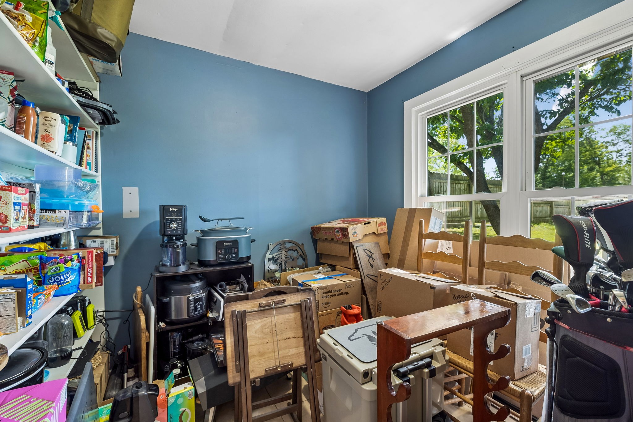 313 Cullum Street Carthage, TN 37030 - Photo 22 of 60 a view of a workspace with furniture and a bookshelf