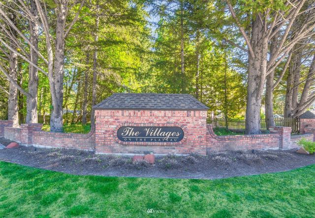 a sign on the side of a road