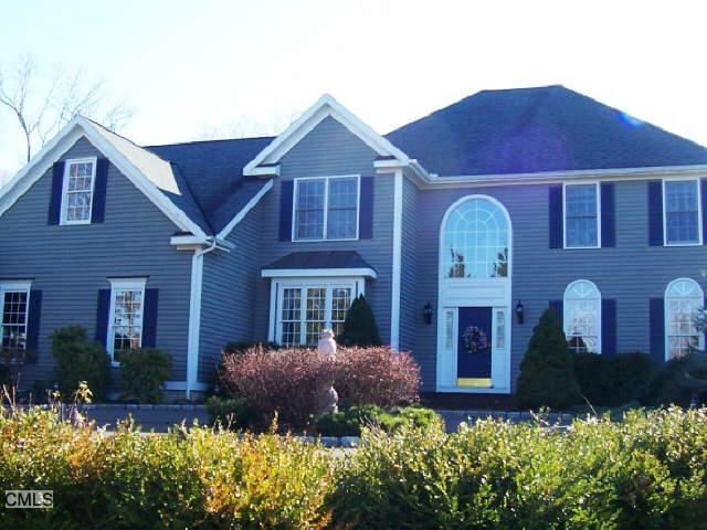 36 Cobblers Mill Road Newtown, CT 06482 - Photo 1 of 1 front view of a house with a yard