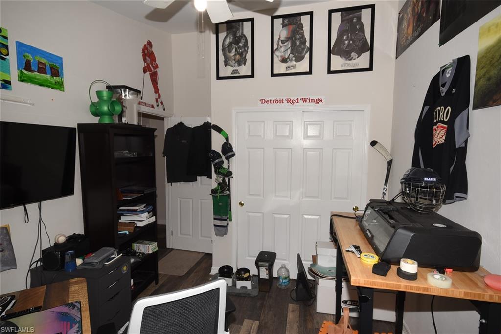 11738 Eros Road Lehigh Acres, FL 33971 - Photo 20 of 42 a view of a workspace with furniture