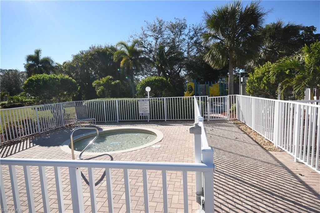 11738 Eros Road Lehigh Acres, FL 33971 - Photo 29 of 42 a view of balcony with wooden floor and outdoor seating