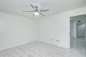 17331 Red Oak Drive, Unit 45 Houston, TX 77090 - Photo 14 of 25 an empty room