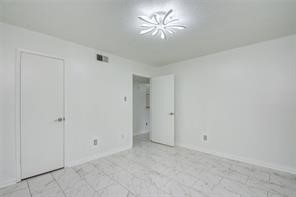 17331 Red Oak Drive, Unit 45 Houston, TX 77090 - Photo 19 of 25 a view of an empty room