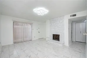 a view of a bathroom with a glass door