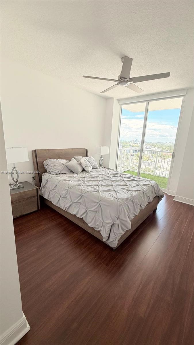 1250 South Miami Avenue, Unit 1913 Miami, FL 33130 - Photo 17 of 29 a bedroom with a bed and a large window