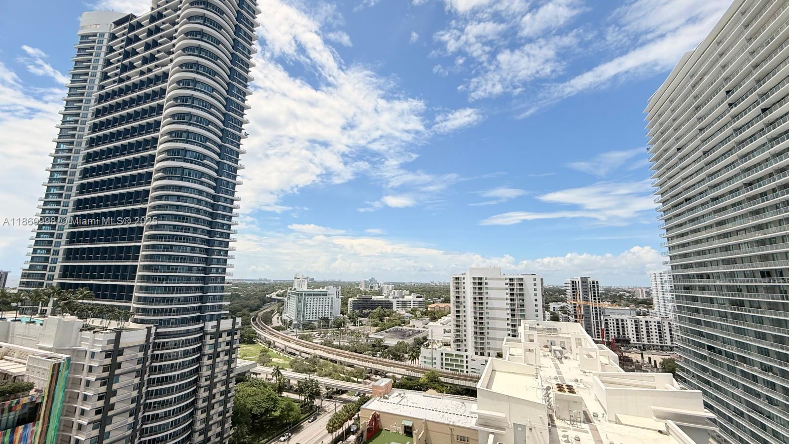 1250 South Miami Avenue, Unit 1913 Miami, FL 33130 - Photo 24 of 29 a view of a city with tall buildings