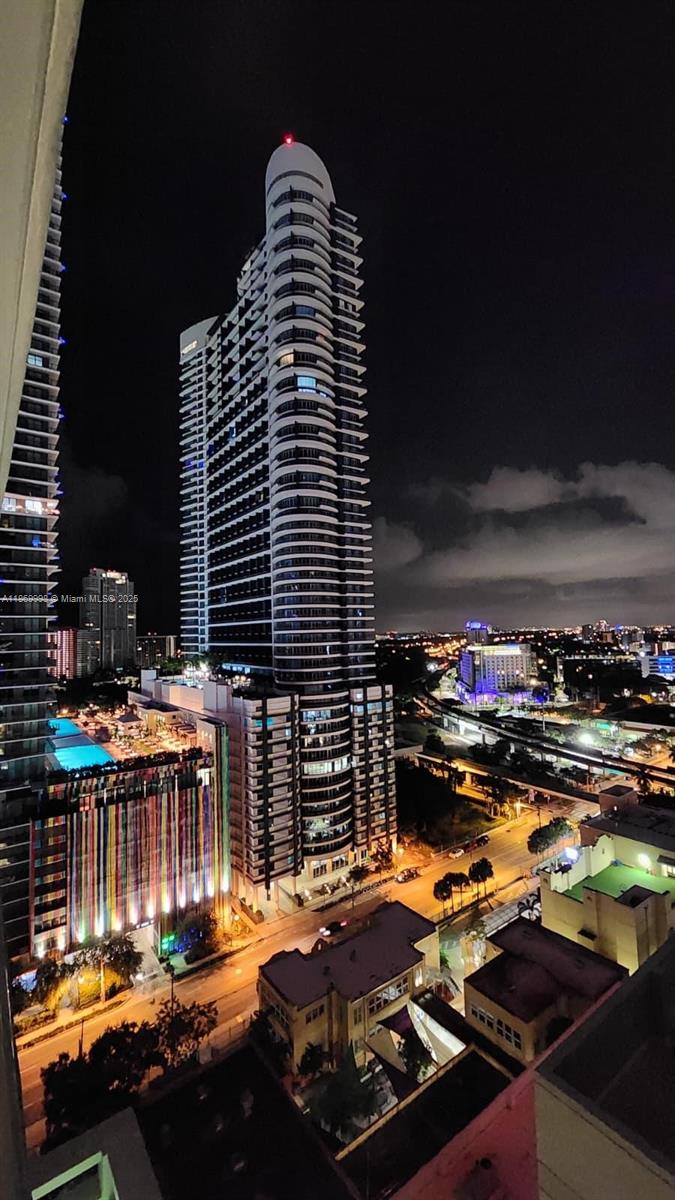 1250 South Miami Avenue, Unit 1913 Miami, FL 33130 - Photo 27 of 29 a view of a swimming pool with an outdoor seating