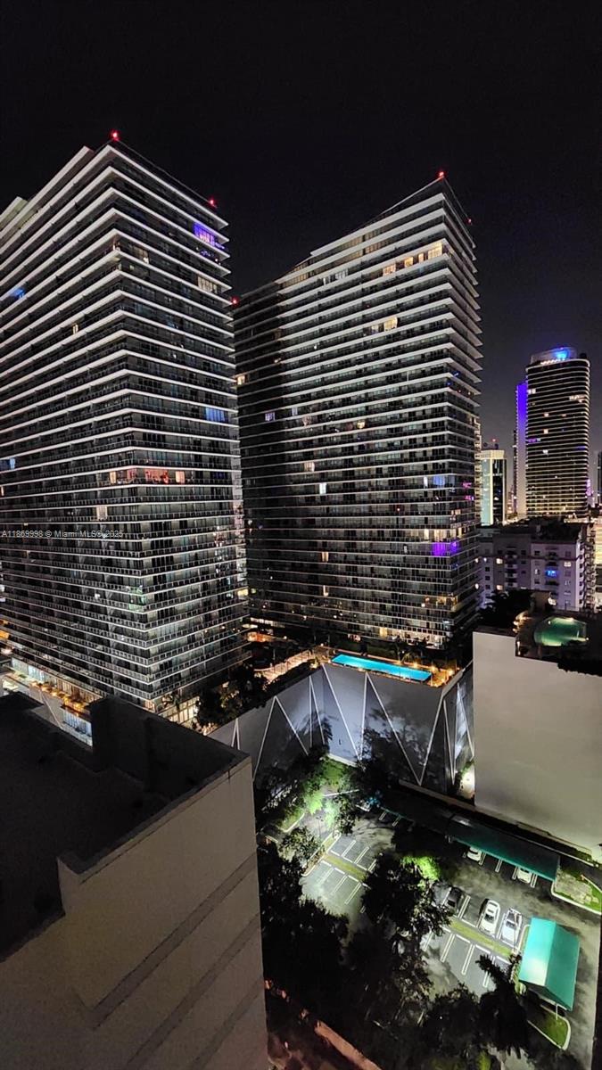 1250 South Miami Avenue, Unit 1913 Miami, FL 33130 - Photo 28 of 29 a front view of a building with sitting area