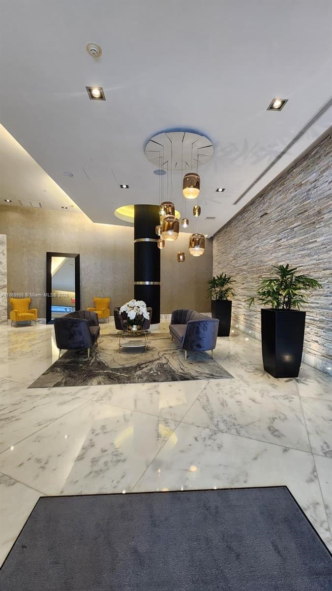 1250 South Miami Avenue, Unit 1913 Miami, FL 33130 - Photo 4 of 29 a view of a room with a flat screen tv