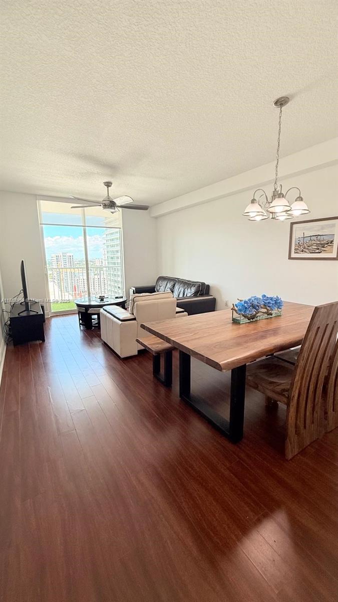 1250 South Miami Avenue, Unit 1913 Miami, FL 33130 - Photo 9 of 29 a living room with furniture and wooden floor