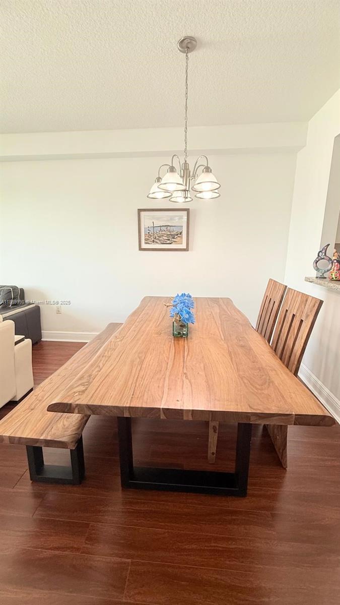 1250 South Miami Avenue, Unit 1913 Miami, FL 33130 - Photo 10 of 29 a bedroom with a bed and wooden floor